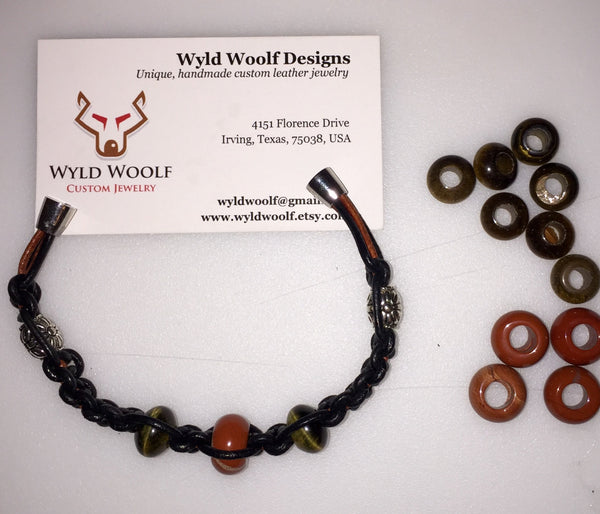 Black and brown knotted leather bracelet with Tiger's Eye and Red Jasper gemstone beads.