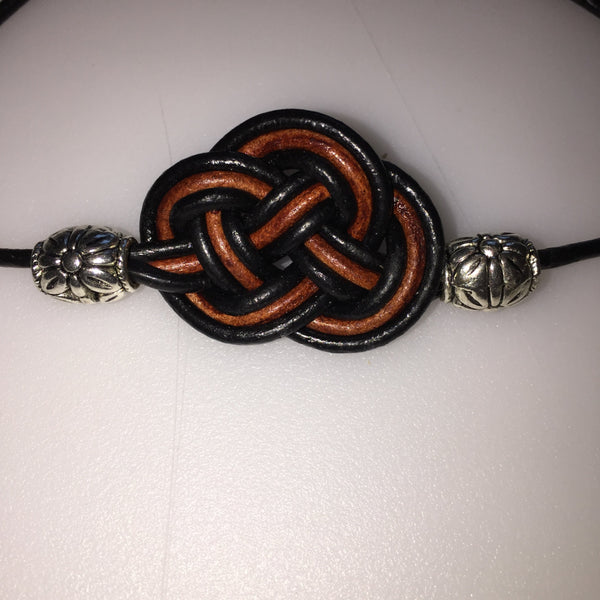 Handmade leather bracelet with Celtic Double Coin knot