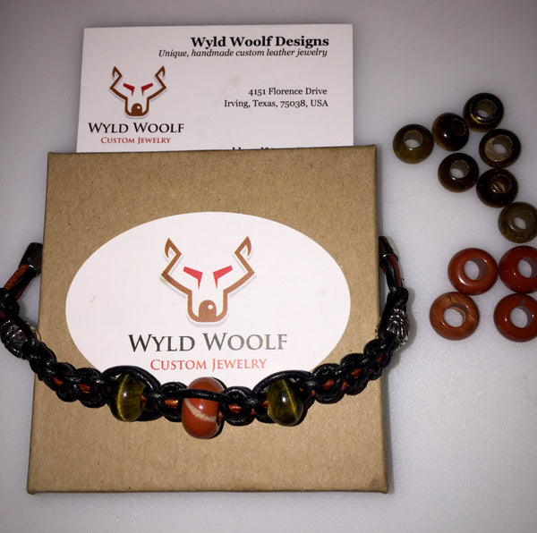 Black and brown knotted leather bracelet with Tiger's Eye and Red Jasper gemstone beads.